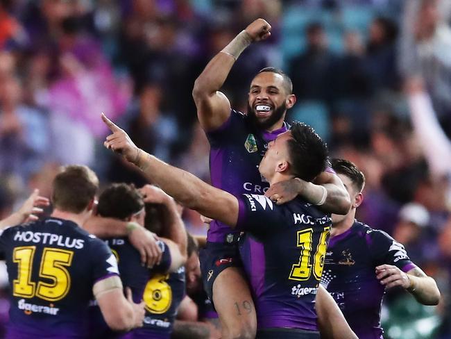 Josh Addo-Carr celebrates victory with team mates at the final siren.