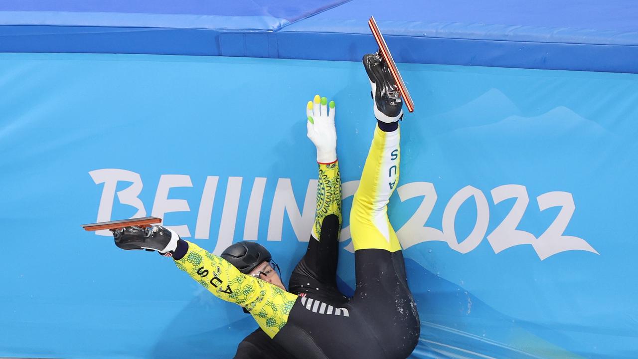 Brendan Corey of Team Australia crashes during the Men's 1000m Quarterfinals on day three of the Beijing 2022 Winter Olympic Games. Picture: Getty Images.