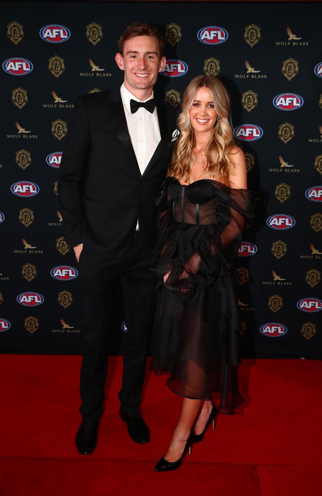 Harris Andrews of the Lions and Emily Halverson in Brisbane. Picture: Chris Hyde