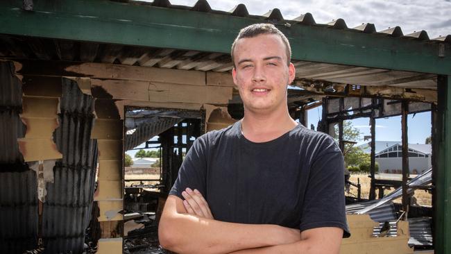 Sean Williams, at the burnt out home where earlier in the year he saved a woman from a house fire in Tailem Bend. Picture: Emma Brasier