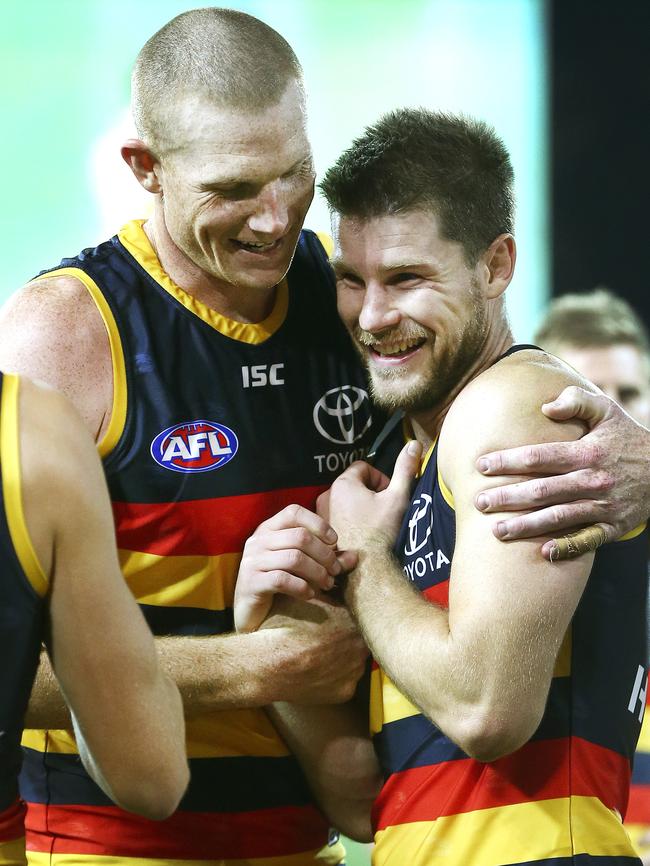 Former Blues Sam Jacobs and Bryce Gibbs celebrate another win with the Crows. Picture: Sarah Reed