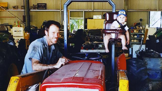 Atherton man Jeff Snelling drowned at Lake Tinaroo after going to the assistance of his two sons. Photo of Jeff Snelling and his nephew Ken Snelling, aged 12 months, in the family's work shed. Picture courtesy Snelling family.