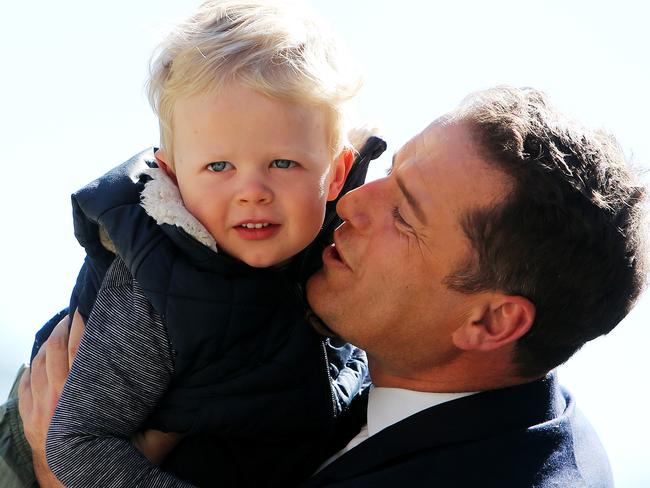 Kissing babies: Karl Stefanovic with Ben Fordham's son Freddie. Picture: Tim Hunter