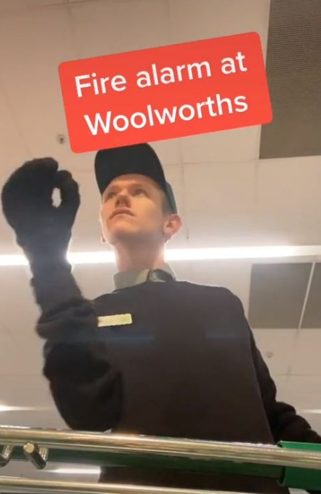 The Woolies staffer dancing to a fire alarm in store. Picture: ashe_media