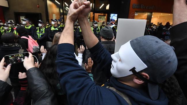 Protesters taunt Victoria Police during the rally. Picture: AAP