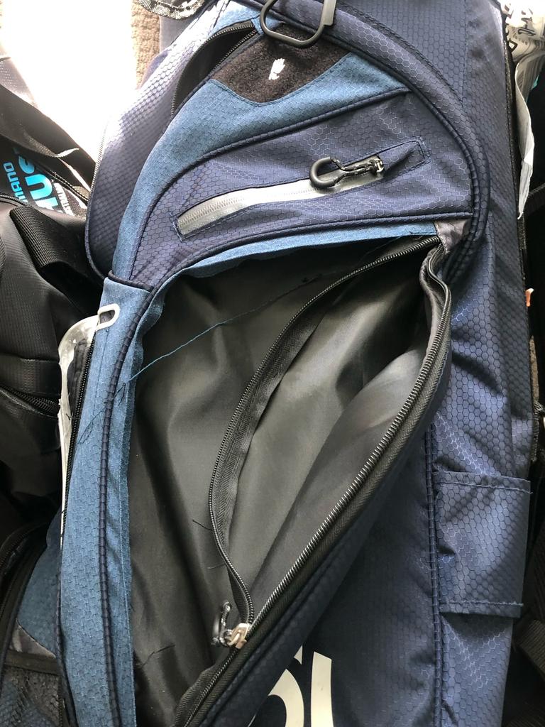 The burst seam of Patrick’s golf bag. Picture: Supplied.