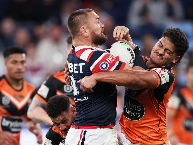 SYDNEY, AUSTRALIA - AUGUST 26:  Jared Waerea-Hargreaves of the Roosters is tackled during the round 26 NRL match between Sydney Roosters and Wests Tigers at Allianz Stadium on August 26, 2023 in Sydney, Australia. (Photo by Matt King/Getty Images)