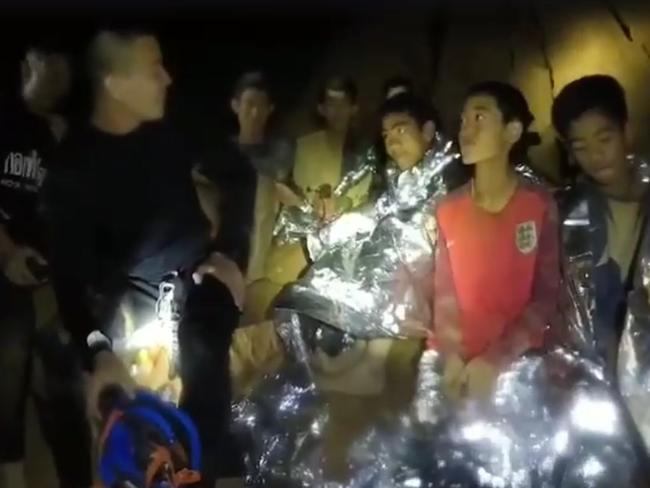 The Thai soccer team appeared to be in good spirits as they talked to navy divers. <br/>Picture: Thai NavySeal