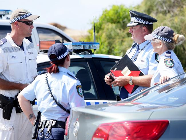 Police at the scene in 2016 where Jesse James went missing off Snapper Point. Picture: Peter Clark