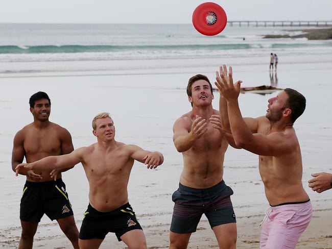 Dean Britt (second right) is shooting for a spot on the Melbourne Storm bench. Picture: Colleen Petch