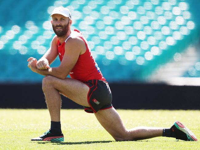 Jarrad McVeigh stretches before training. Picture: Phil Hillyard