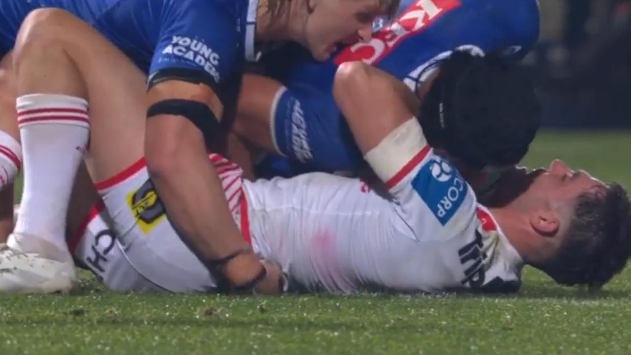 Preston and Crichton complete the tackle on Flanagan. Picture: Fox League