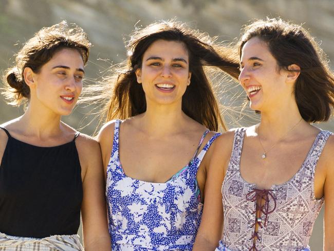 Brooke Malouf (long hair) Lea Fernandez(short hair) and Kaila D'Agostino pictured at Bronte Beach tin Sydney. A new generation of workers is re-defining success and its no longer all about the money, according to a LinkedIn report.  Pic Jenny Evans