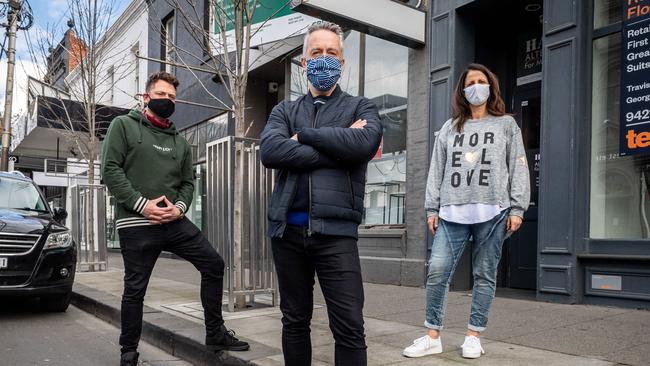 Matt Lanigan, left, has been vocal on the struggles of Chapel St traders during the coronavirus outbreak. He’s pictured with fellow traders Paul Kasteel and Katy Georgiou. Picture: Jake Nowakowski