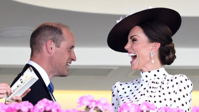 ASCOT, ENGLAND - JUNE 17: Catherine, Duchess of Cambridge, and Prince William, Duke of Cambridge laugh in the Royal Box during Royal Ascot 2022 at Ascot Racecourse on June 17, 2022 in Ascot, England. (Photo by Chris Jackson/Getty Images)