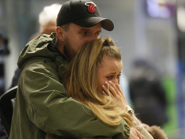 People look at a memorial at Borispil international airport outside Kiev, Ukraine. Picture: AP