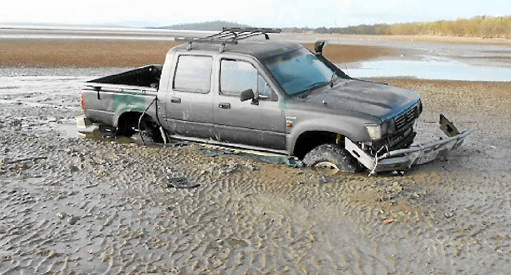 Mudflaps sink deep into mudflats | The Courier Mail