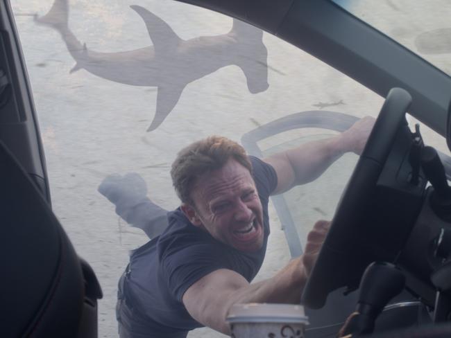 Flying sharks ... Ian Ziering portrays Fin Shepard in a scene from Sharknado 3: Oh Hell No! Picture: Syfy via AP