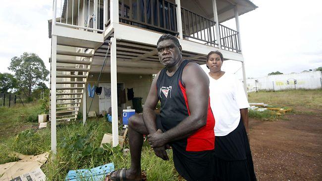 Greg Orsto, left, and Nazareth Alfred at their home on the Tiwi Islands, which is still not finished or connected to power after two years. Picture: Terry Trewin