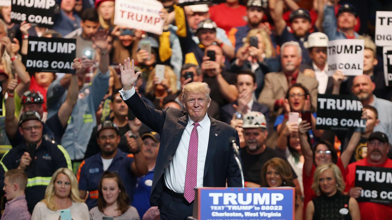 Donald Trump waves to the crowd as he arrives for his rally at the Charleston Civic Center on May 5, 2016. Picture: Mark Lyons/Getty Images/AFP.