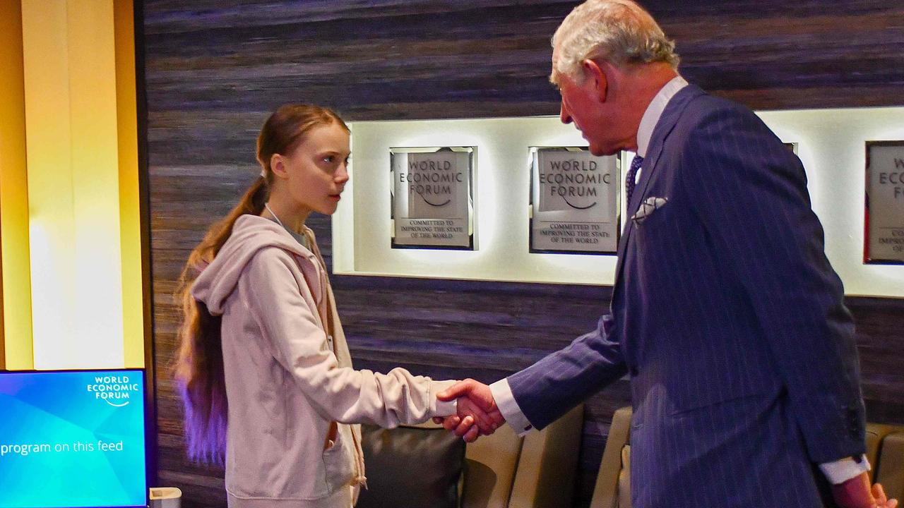 Prince Charles, Prince of Wales (R), greeting Swedish climate activist Greta Thunberg (L) at the World Economic Forum (WEF) annual meeting in Davos in January 2020.