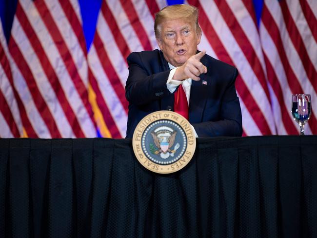 US President Donald Trump listens during a Latinos for Trump Coalition roundtable meeting at the Treasure Island Hotel and Casino on September 13, 2020, in Las Vegas, Nevada. (Photo by Brendan Smialowski / AFP)