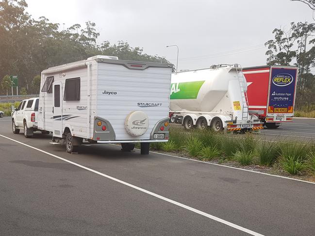 Caravans parked in designated truck parking bays at Arrawarra rest stop.