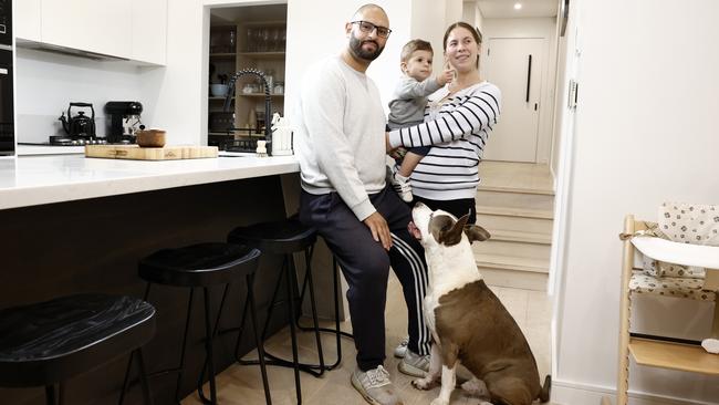 Stephen Michaels and Magdeleine Hountalas, with their son James Michaels, are selling their Padstow home and think they were very lucky to buy when they did. Picture: Richard Dobson