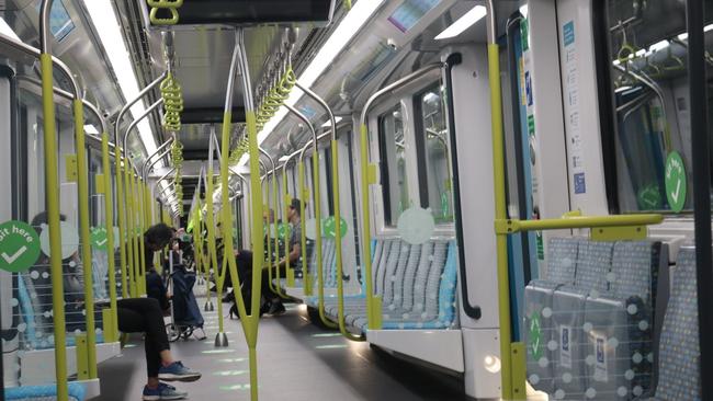 Inside a rattling Sydney Metro carriage.