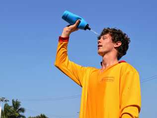 COOL OFF: Lifeguard, Jake Armstrong-Green is ready for the scorcher of a weekend ahead. Picture: Inge Hansen