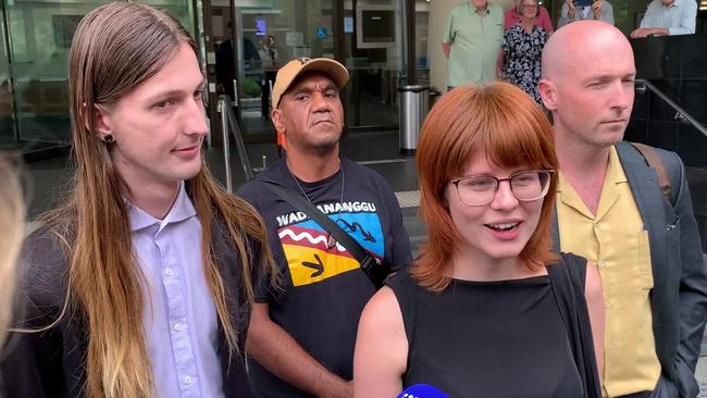 Disrupt Burrup Hub activists Matilda Lane-Rose, Emil Davey (L) and Jesse Noakes (R) leave Perth Magistrates Court after they escaped jail over their attempted protest at the home of Woodside Energy chief Meg O’Neill. Picture: Paul Garvey