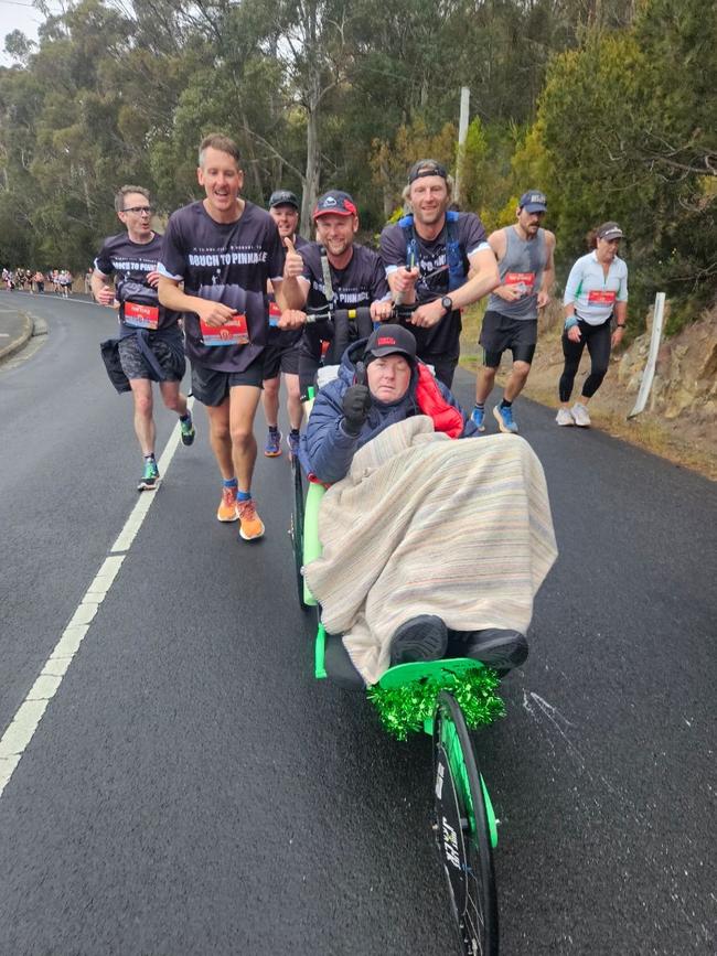 Bouch to Pinnacle team with Simon Boucher, who was diagnosed with advanced melanoma in July. Photo: Gabby Wilson