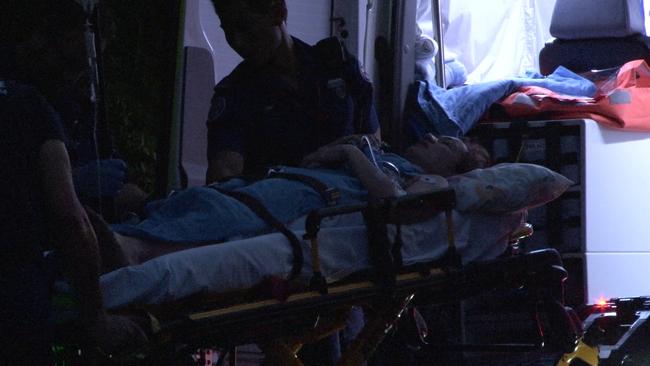 The woman is rushed to hospital last night. Picture: TNV