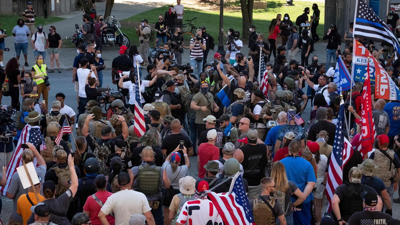Members of patriot militias march in Louisville, Kentucky, on September 5, 2020, to fend off BLM protesters. Picture: Jeff Dean