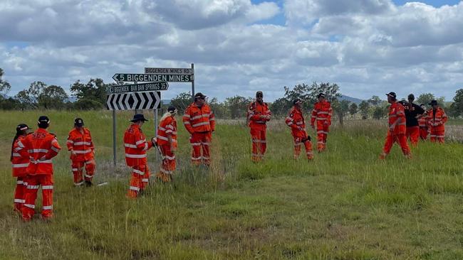 The scene at Biggenden as SES search the surrounding fields after a shed fire claimed two lives.