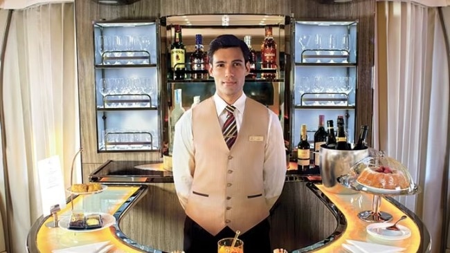 Sadly, fancy extras like Emirates' walk up bar are a dying breed of extravagance. 