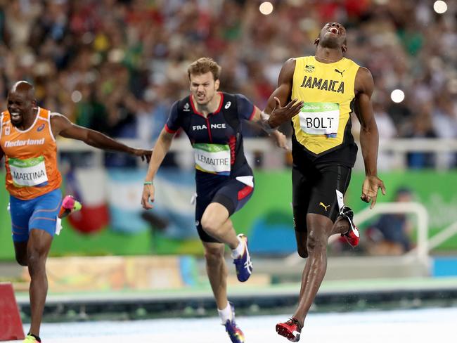 RIO DE JANEIRO, BRAZIL - AUGUST 18: Usain Bolt of Jamaica wins the Men's 200m Final on Day 13 of the Rio 2016 Olympic Games at the Olympic Stadium on August 18, 2016 in Rio de Janeiro, Brazil. (Photo by Ezra Shaw/Getty Images)