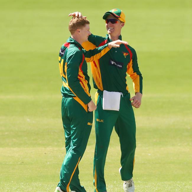 Jordan Silk congratulates Andrews after the dismissal of Jake Fraser-McGurk of Victoria during the Marsh One Day Cup match between Victoria and Tasmania at CitiPower Centre on March 10, 2021 in Melbourne, Australia. (Photo by Kelly Defina/Getty Images)