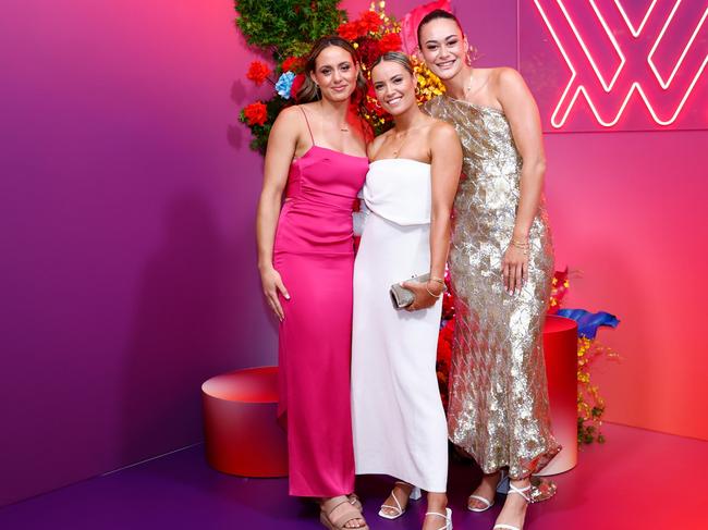 The women, from three different clubs, wore elegant frocks. Picture: Dylan Burns/AFL Photos via Getty Images