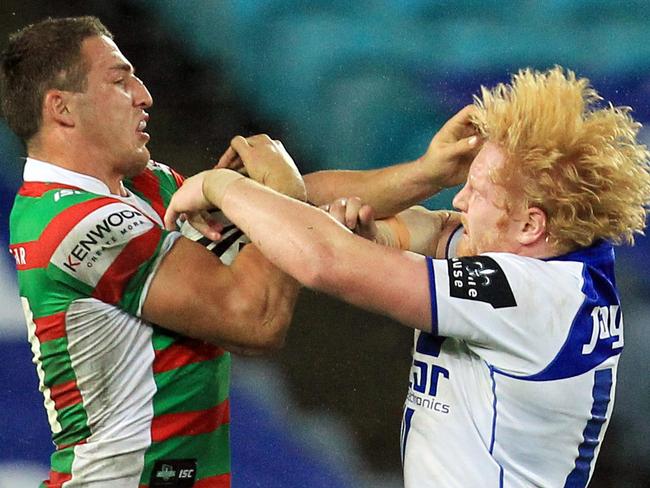 England teammates Sam Burgess (L) and James Graham come together during Canterbury Bulldogs v South Sydney Rabbitohs NRL game at ANZ Stadium, Olympic Park, Homebush in Sydney.