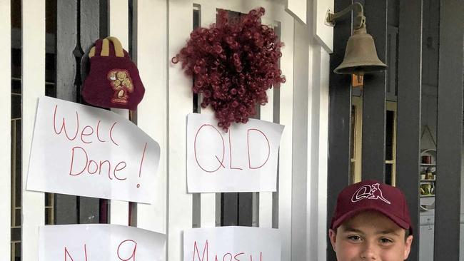 Braelan Marsh with the messages of congratulations this his family put on the front door to welcome him home. Picture: CONTRIBUTED