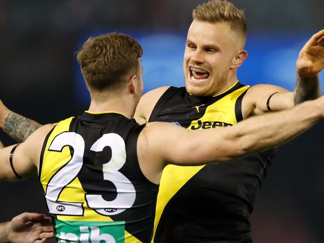 MELBOURNE, AUSTRALIA - JUNE 28: Kane Lambert of the Tigers (left) celebrates a goal with Brandon Ellis of the Tigers during the 2018 AFL round 15 match between the Richmond Tigers and the Sydney Swans at Etihad Stadium on June 28, 2018 in Melbourne, Australia. (Photo by Adam Trafford/AFL Media/Getty Images)