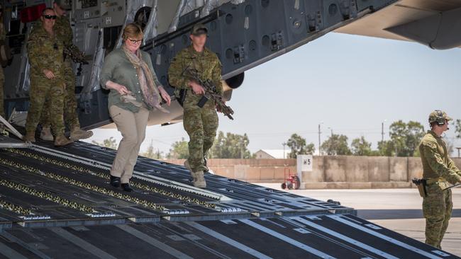 Minister for Defence Linda Reynolds and Vice Chief of Defence Force Vice Admiral David Johnston disembark an RAAF C-17A Globemaster during a visit to Australian and New Zealand personnel at the Taji Military Complex, Iraq. Picture: Supplied