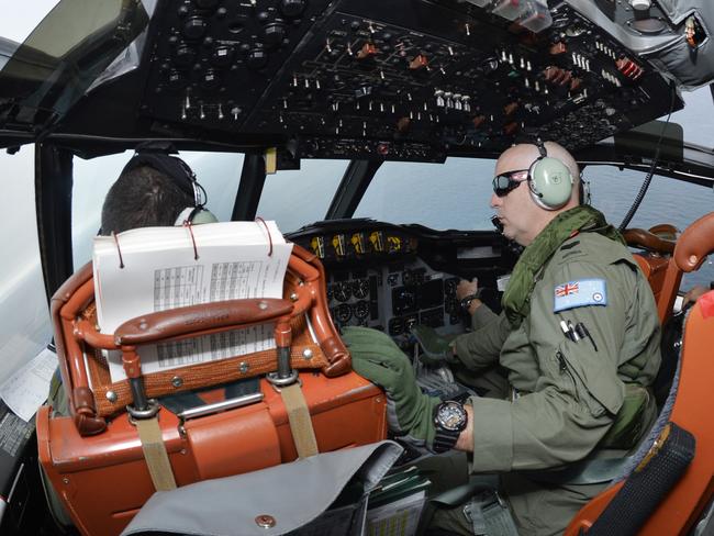 NEWS Australian RAAF Orion P3 searching southern Indian Ocean 2400Kms south west of Perth, Western Australia for missing Malaysian plane MH370 Photo Stewart Allen