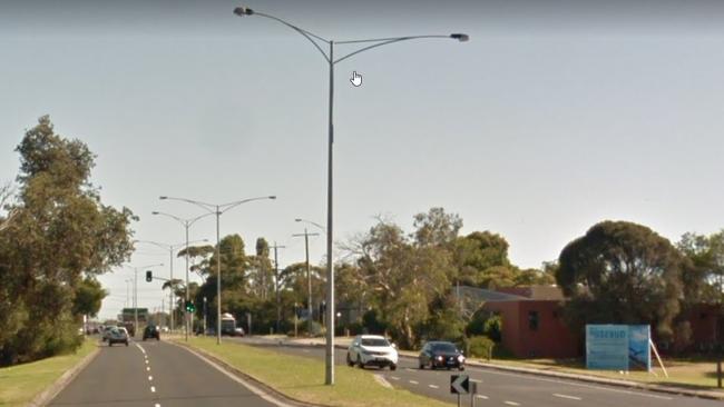 A careless, uninsured driver who smashed into Boneo Rd light poles similar to these has avoided having to pay $10,500 to have them fixed.