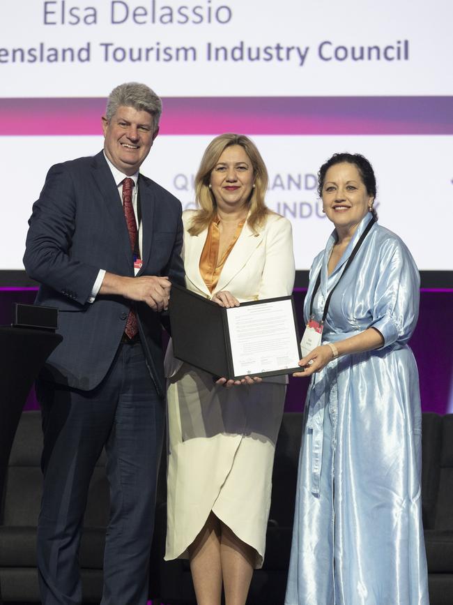 Minister for Tourism Stirling Hinchliffe, Premier Annastacia Palaszczuk and Elsa Delassio, Chair of the Queensland Tourism Industry Council sign the Destination Queensland partnership agreement at the Destination Queensland conference at the Gold Coast Convention and Exhibition Centre. Picture: NewsWire / Sarah Marshall