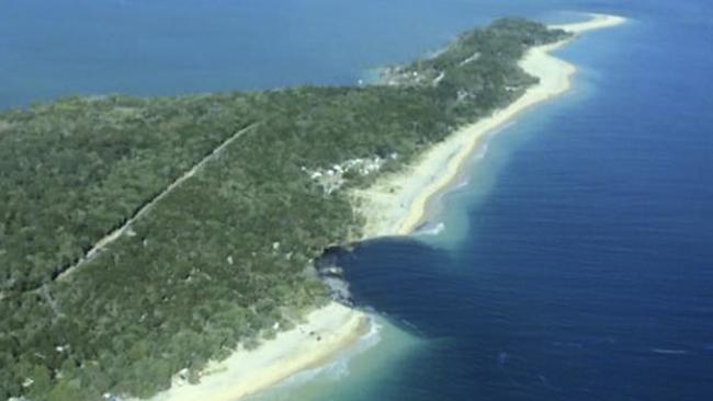 An image obtained Sunday, Sept. 27, 2015 of a 150-metre long and 50 metre wide sinkhole which opened up at MV Beagle Campground, north of Queensland's Rainbow Beach at Inskip Point. (AAP Image/Higgins Storm Chasing) NO ARCHIVING, EDITORIAL USE ONLY