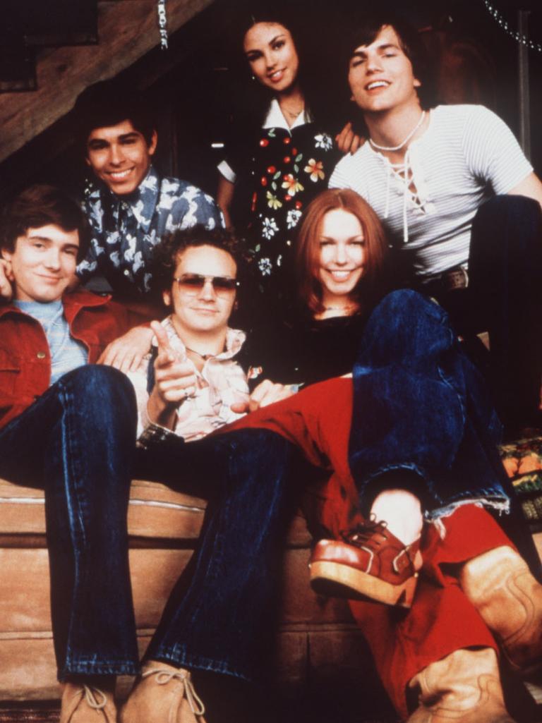 They originally met on the set of That ‘70s Show, along with Mila Kunis (third from left, back row).