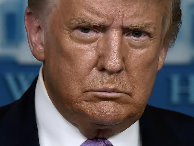 US President Donald Trump answers question during a press conference in the Brady Briefing Room of the White House in Washington, DC, on August 5, 2020. (Photo by Olivier DOULIERY / AFP)