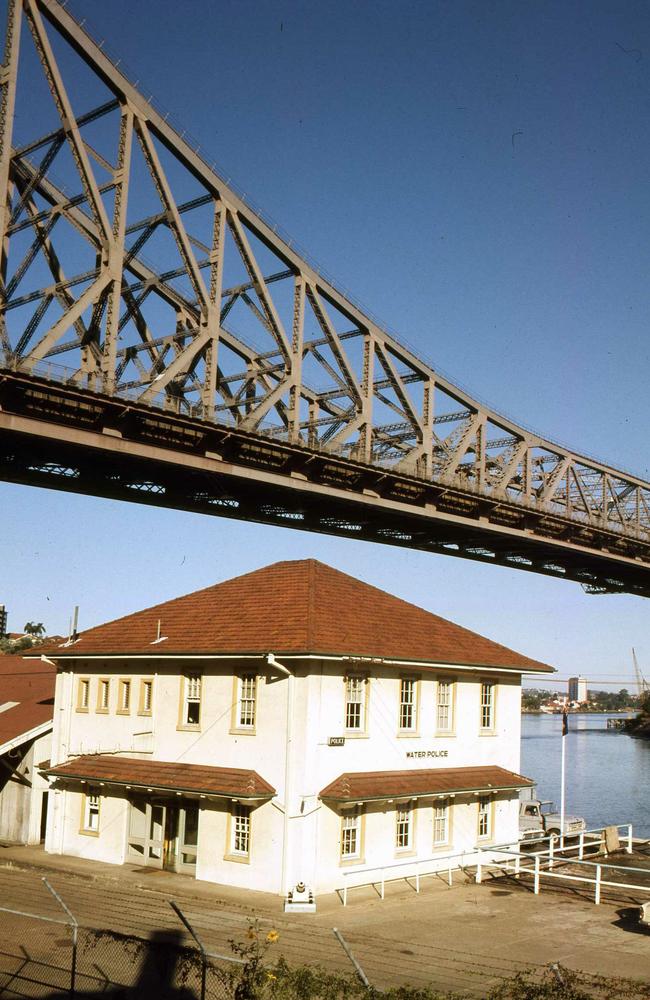 The Brisbane Water Police headquarters pictured in 1971 nestled under the Story Bridge.